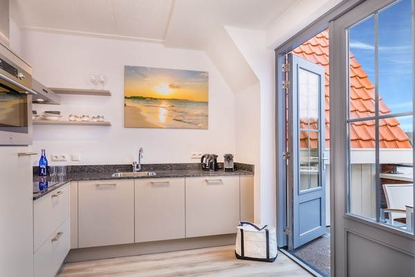Foto van Appartement in Zeeland met luxe voorzieningen - Vakantiehuis in Koudekerke - Kitchen