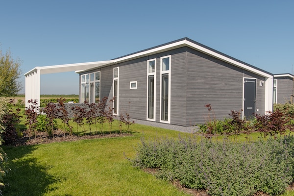 Foto van Modern appartement in Zeeland met uitzicht - Vakantiehuis in Wemeldinge - ExteriorSummer