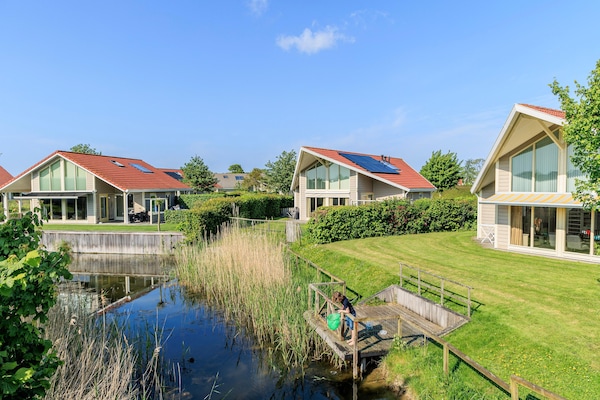 Foto van Ruim Huis in Nederland voor 8 Personen - Vakantiehuis in Kortgene - ExteriorSummer
