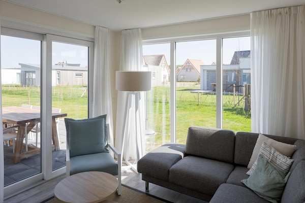 Foto van Bungalow in Nieuwvliet Bad Beach Resort - Vakantiehuis in Nieuwvliet-Bad - LivingRoom