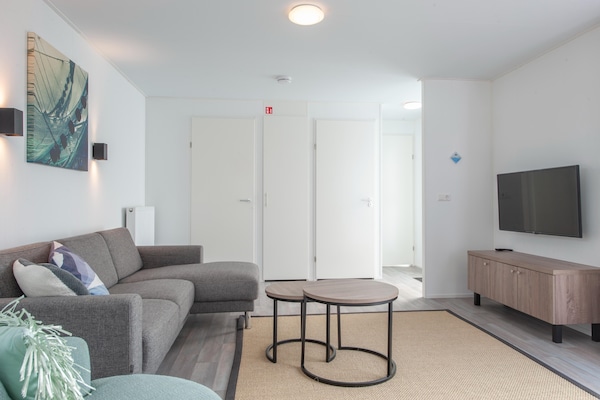 Foto van Hostel in Nieuwvliet bij het Strand - Vakantiehuis in Nieuwvliet-Bad - LivingRoom