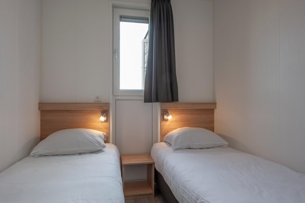 Foto van Hostel in Nieuwvliet bij het Strand - Vakantiehuis in Nieuwvliet-Bad - BedRoom