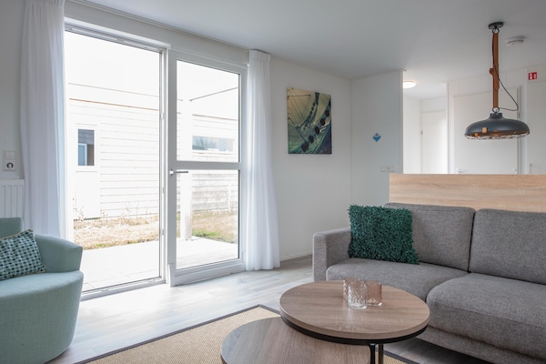 Foto van Lodge in Nieuwvliet Bad bij het Strand - Vakantiehuis in Nieuwvliet-Bad - LivingRoom