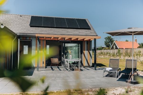 Foto van Lodge in Zeeland bij Nieuwvliet Strand - Vakantiehuis in Nieuwvliet-Bad - TerraceBalcony
