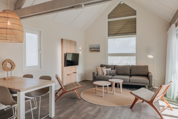 Foto van Lodge in Zeeland bij Nieuwvliet Strand - Vakantiehuis in Nieuwvliet-Bad - LivingRoom