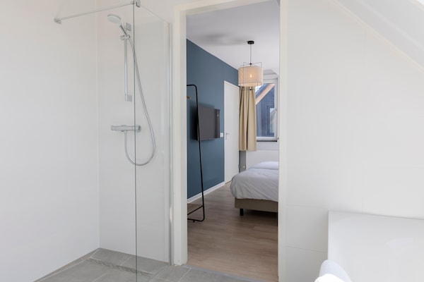 Foto van Modern toevluchtsoord vlakbij het strand - Vakantiehuis in Nieuwvliet - BathRoom
