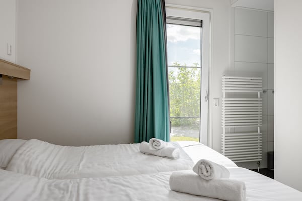 Foto van Lodge in Zeebad vlak bij het strand - Vakantiehuis in Breskens - BedRoom