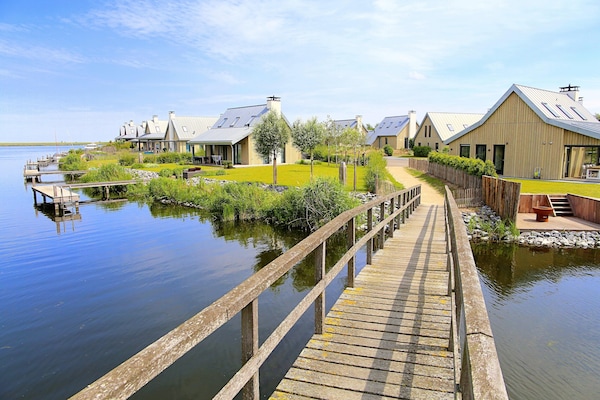 Foto van Villa Oesterdam Deluxe | 6 personen - Vakantiehuis in Tholen - ExteriorSummer