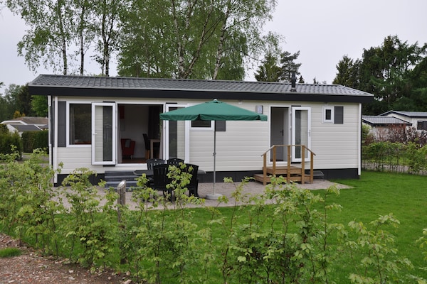 Foto van Chalet in Parc de Kievit met tuin - Vakantiehuis in Baarle-Nassau - GardenSummer