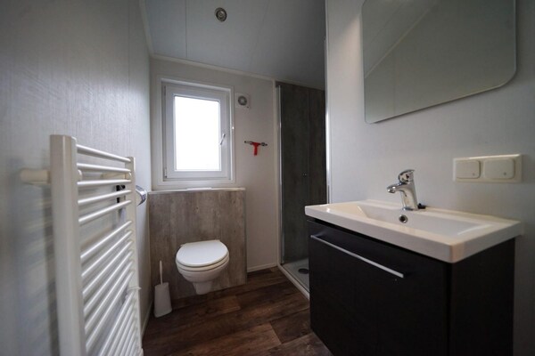 Foto van Huisdiervriendelijk chalet in de buurt van Efteling - BathRoom