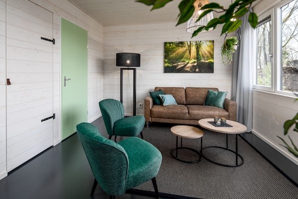 Foto van Lodge in Schaijk met Tuinterras - Vakantiehuis in Schaijk - LivingRoom