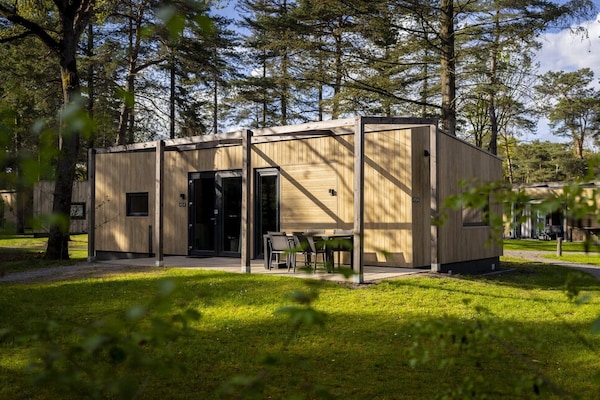 Foto van Lodge in Bospark 't Wolfsven met Tuin - Vakantiehuis in Mierlo - ParkFacilities