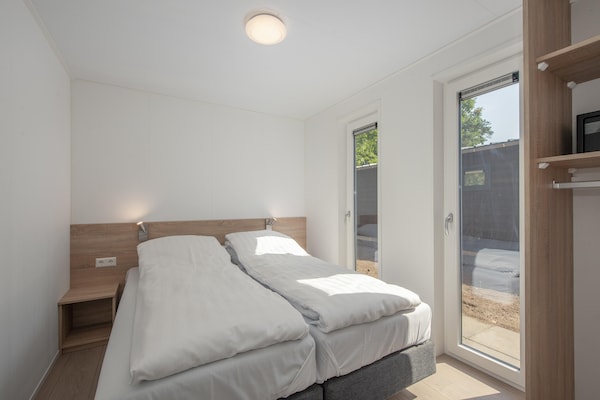 Foto van Lodge in Bospark 't Wolfsven met Tuin - Vakantiehuis in Mierlo - BedRoom