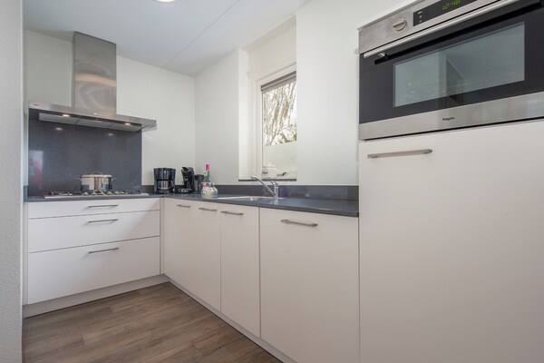 Foto van Villa in Arcen met ligbad en combimagnetron - Vakantiehuis in Arcen - Kitchen