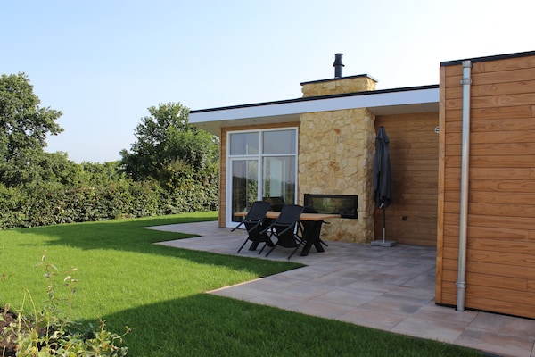 Foto van Gezellige tuinwoning met open haard - Vakantiehuis in Bemelen - ExteriorSummer