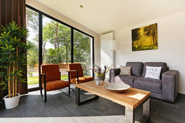 Foto van Chique boslodge met sauna - Vakantiehuis in Markelo - LivingRoom