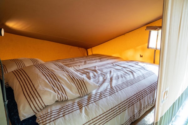 Foto van Luxe familielodge met slaaphoekje buiten - Vakantiehuis in Balkbrug - BedRoom