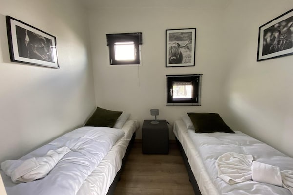 Foto van Licht en sfeervol chalet met terras. - Vakantiehuis in Kampen - BedRoom