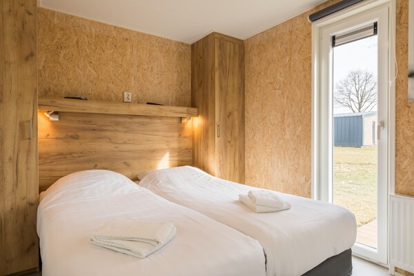 Foto van Wellnessverblijf met sauna - Vakantiehuis in Borger - BedRoom