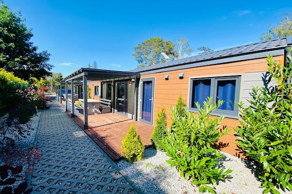 Foto van Bungalow in Dziwnów bij Oostzee Promenade - Vakantiehuis in Dziwnow - ExteriorSummer
